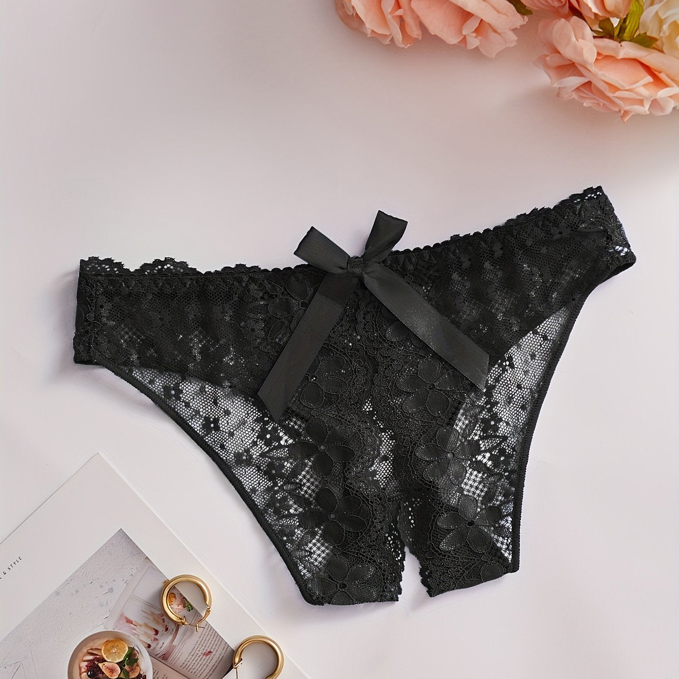 See-through lace crotchless briefs for women's sexy lingerie.