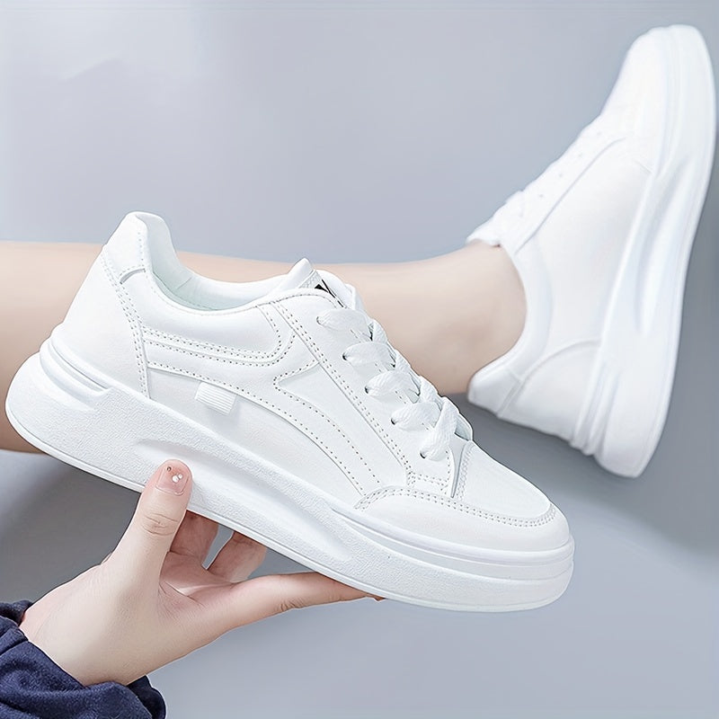 Height increasing lace-up platform skate shoes for women in white, suitable for outdoor walking and available in plus sizes.