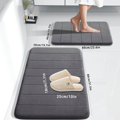 5-piece luxury memory foam bath mat set in black, dark gray, light gray, blue, and brown. Plush, non-slip, ultra absorbent rugs ideal for sink, tub, shower, and toilet. Machine washable, quick dry, soft polyester blend. Perfect for the bathroom.