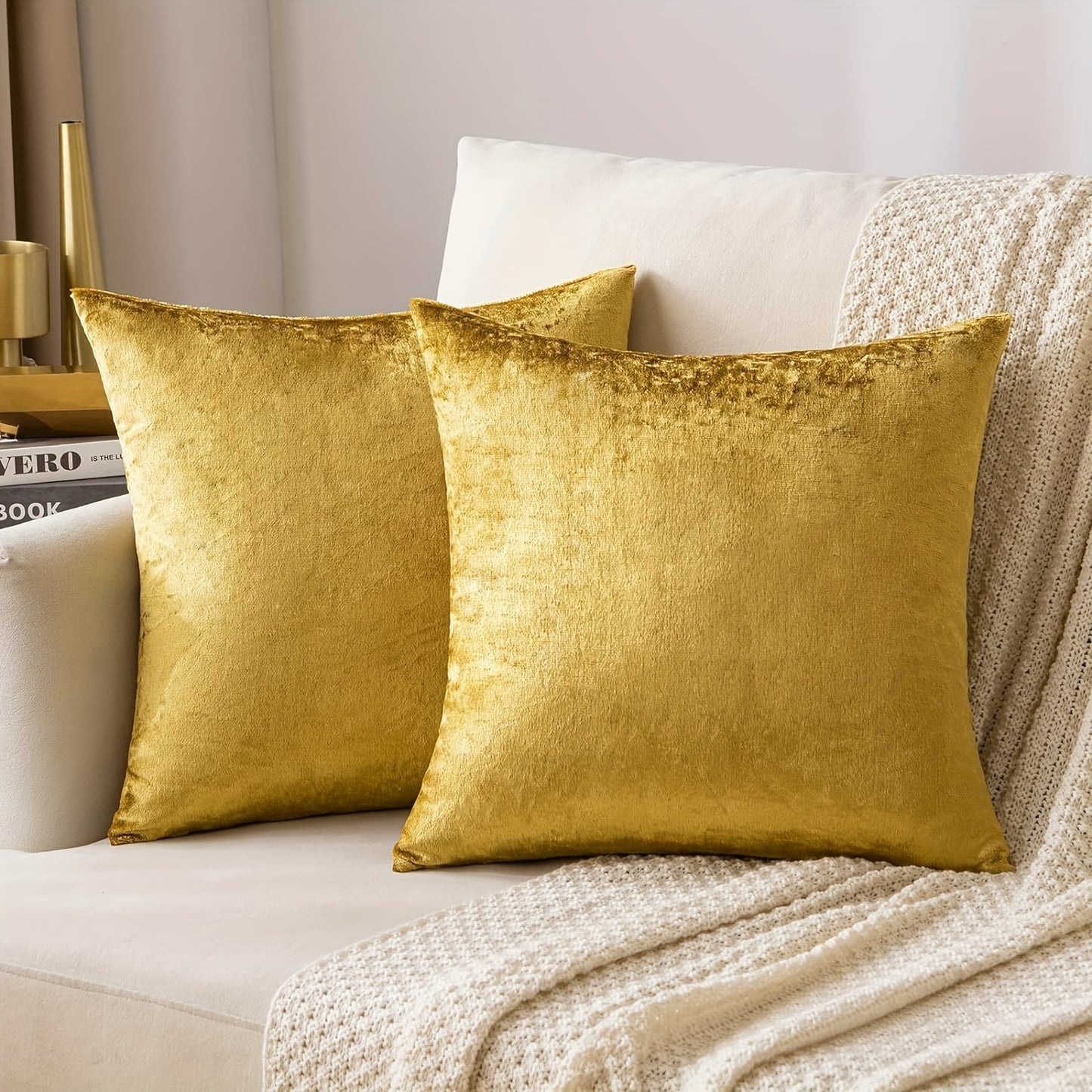 Two golden velvet throw pillow covers, 18x18, for couch or bed.