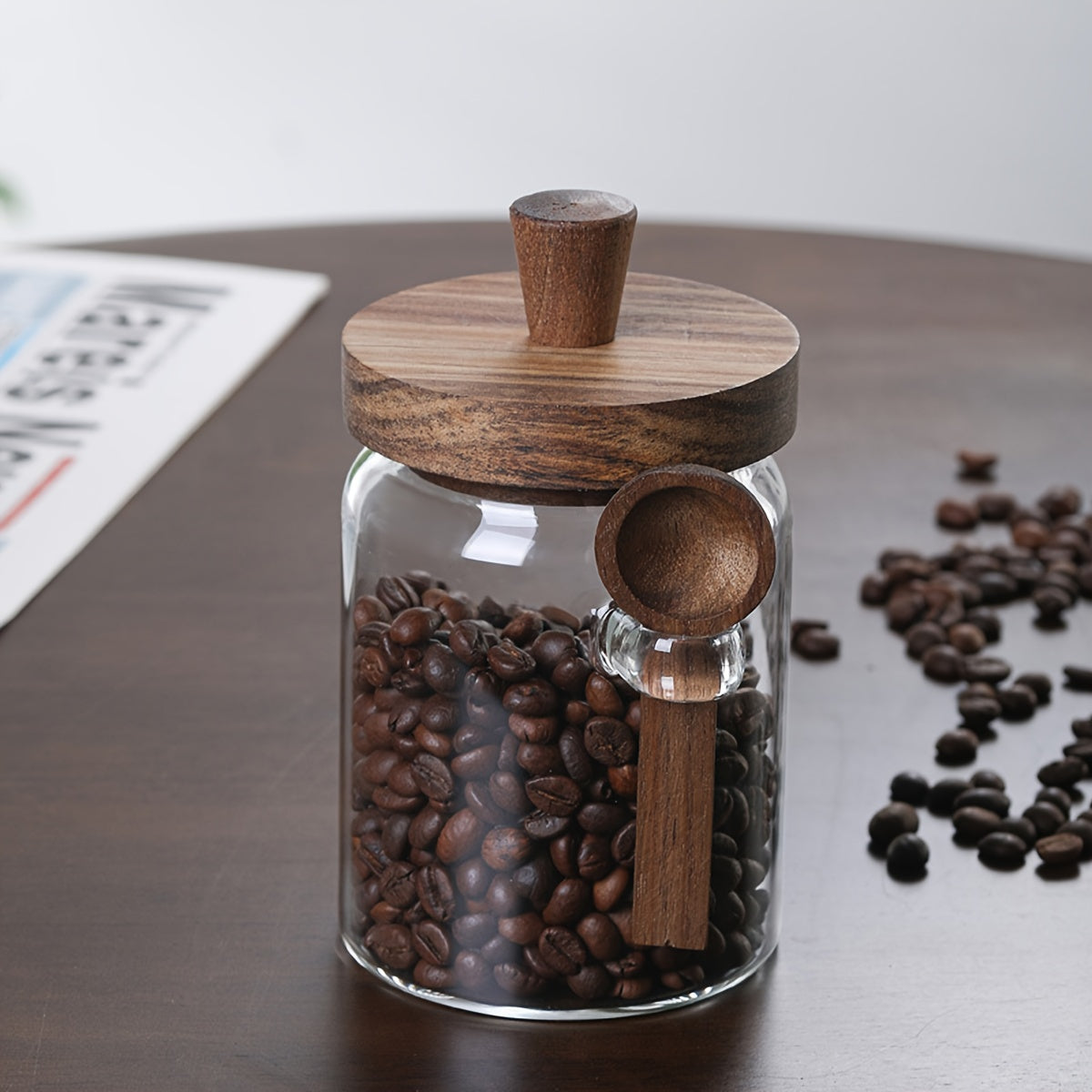 Glass containers for storing coffee, tea, grains, snacks, and pickles.