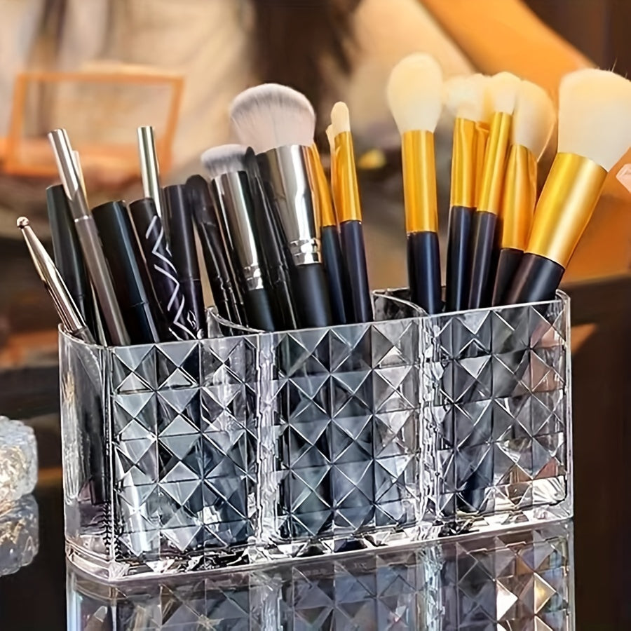 Clear plastic makeup organizer with 3 compartments for cosmetic storage. Ideal for brushes, lipsticks, brow pencils, and remote control. Can be used as a vanity or desk organizer without electricity.