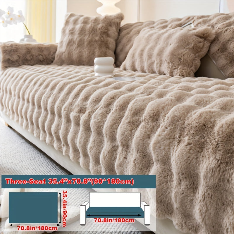 Faux rabbit fur sofa cover for cozy winter warmth. Pet-friendly, machine washable. Fits single to four-seater sofas. Perfect for living room, bedroom, office decor.