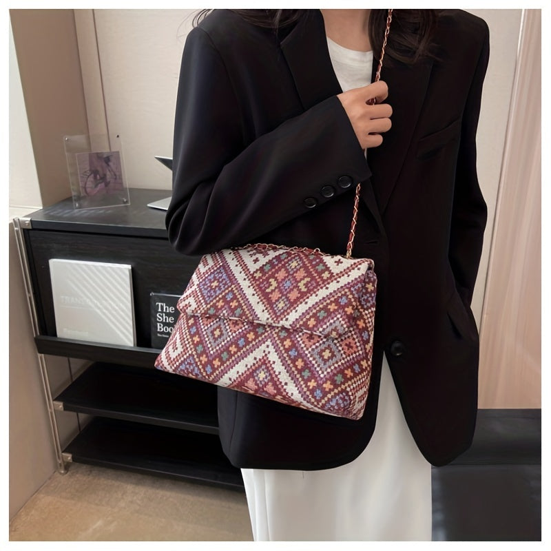 Colorful geometric shoulder bag for women with adjustable strap, magnetic closure, foldable ethnic style, and polyester lining.