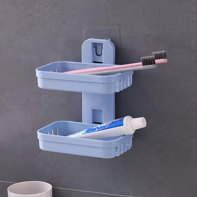 Wall-mounted soap holder with box drain for toiletries and shampoo.