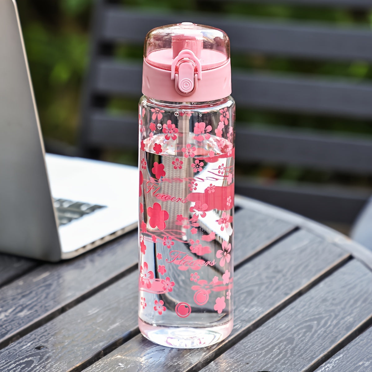 Portable large capacity plastic water bottles with sun and flowers design, leakproof BPA-free tumblers for camping, easy-to-carry, gift-friendly cups.