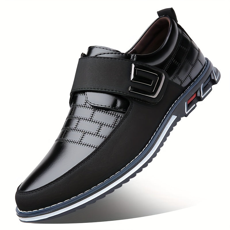 Men's dress loafers with hook and loop fastener for business or casual wear.