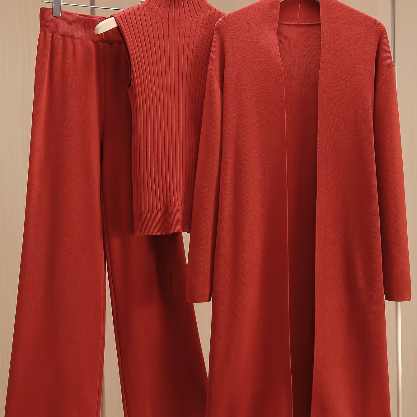 2024 women's three-piece knit set with wide-leg pants, cardigan, and turtleneck sweater.