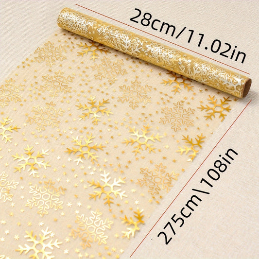 Gold snowflake table runner with an elegant festive design, perfect for Christmas, New Year, and Halloween. Made of durable polyester in multiple colors, measuring 27.94x274.32 cm. Ideal for seasonal table decoration.