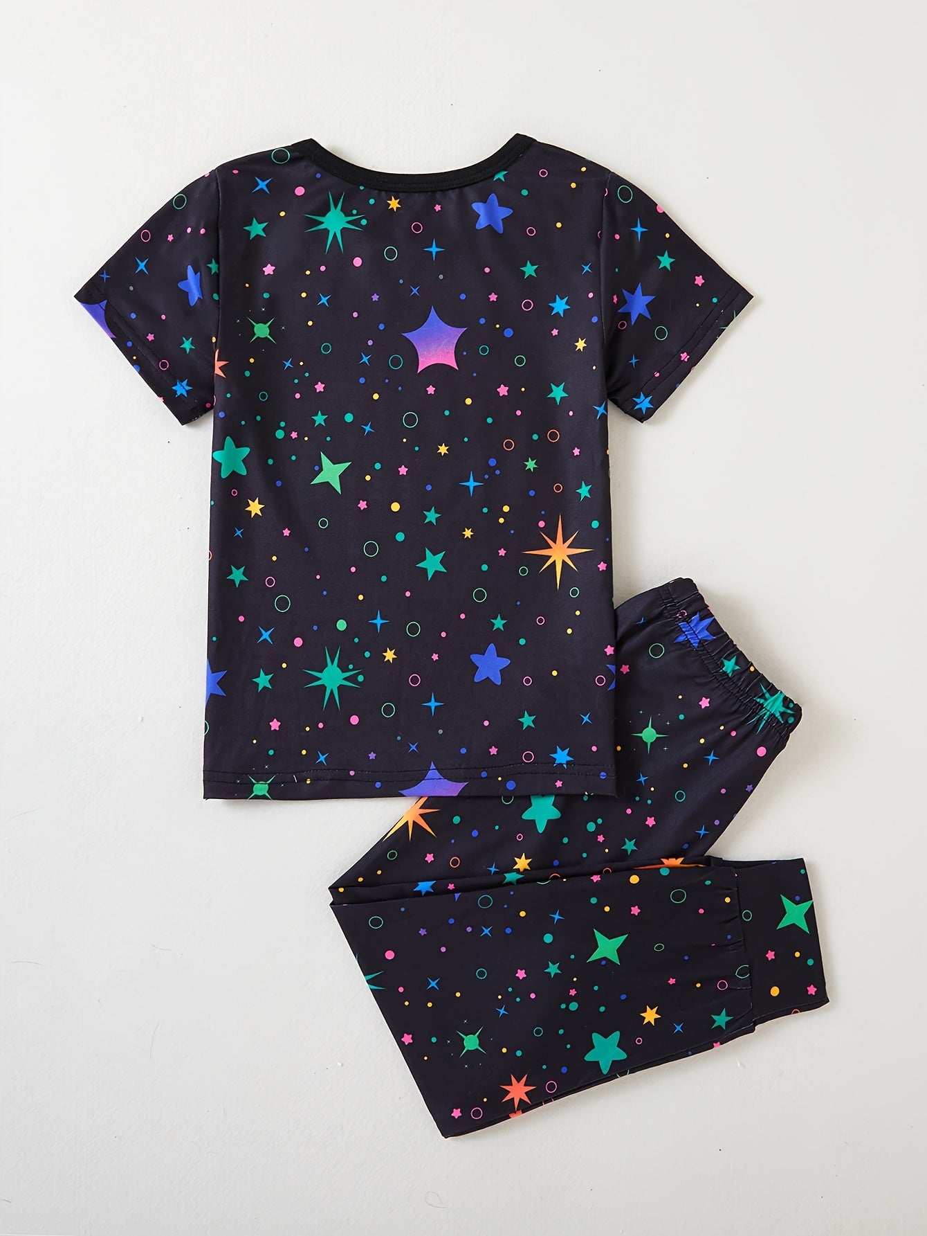 Girls' 2-piece set with cute unicorn hoodie and starry sky pants, perfect for outdoor wear with UV light illumination.