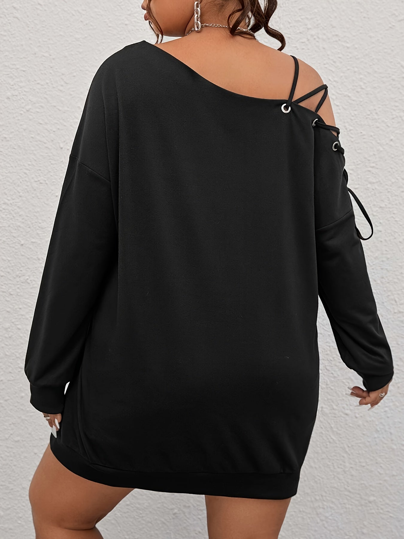 Women's Elegant Long Sleeve T-Shirt made with polyester fabric, has a relaxed fit, and is machine washable.