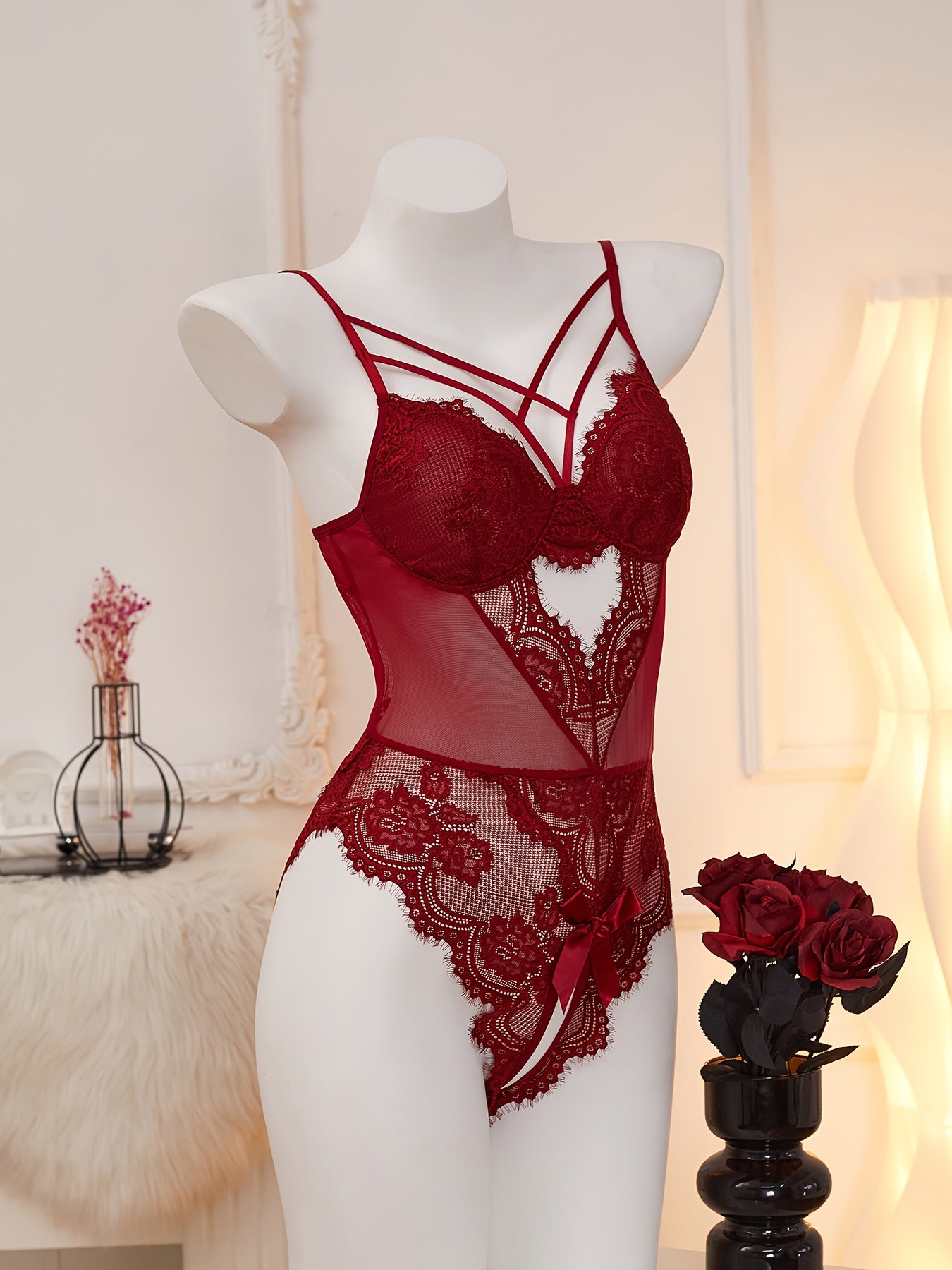 Red lace velvet teddy with heart cut-out, open crotch, and strappy back for women's lingerie.