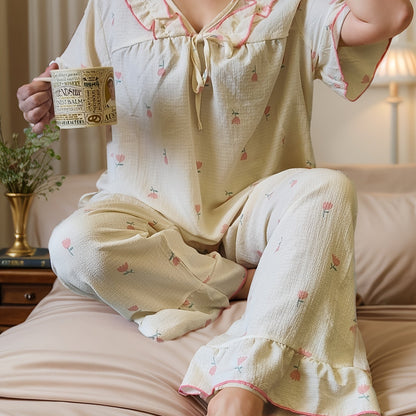 Women's printed pajama set with long pants and short sleeves in large size.