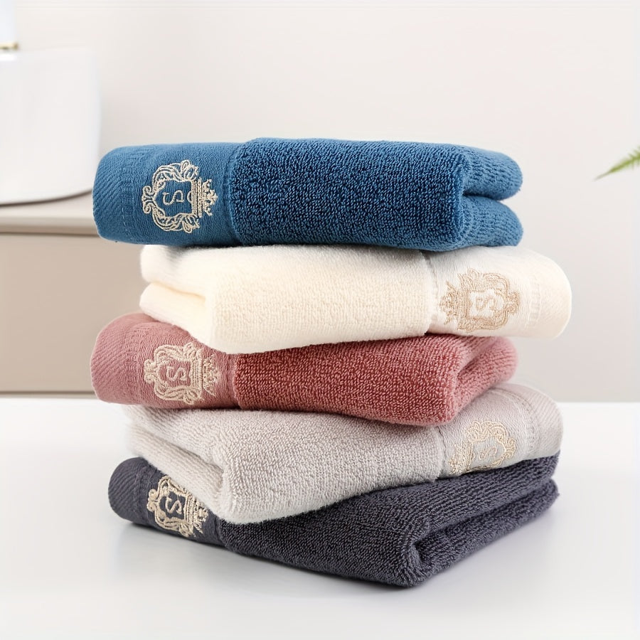 Modern, soft cotton towel set with embroidered character design and luxury crown motif. Highly absorbent, 450 GSM knit fabric. Perfect bathroom gift collection.