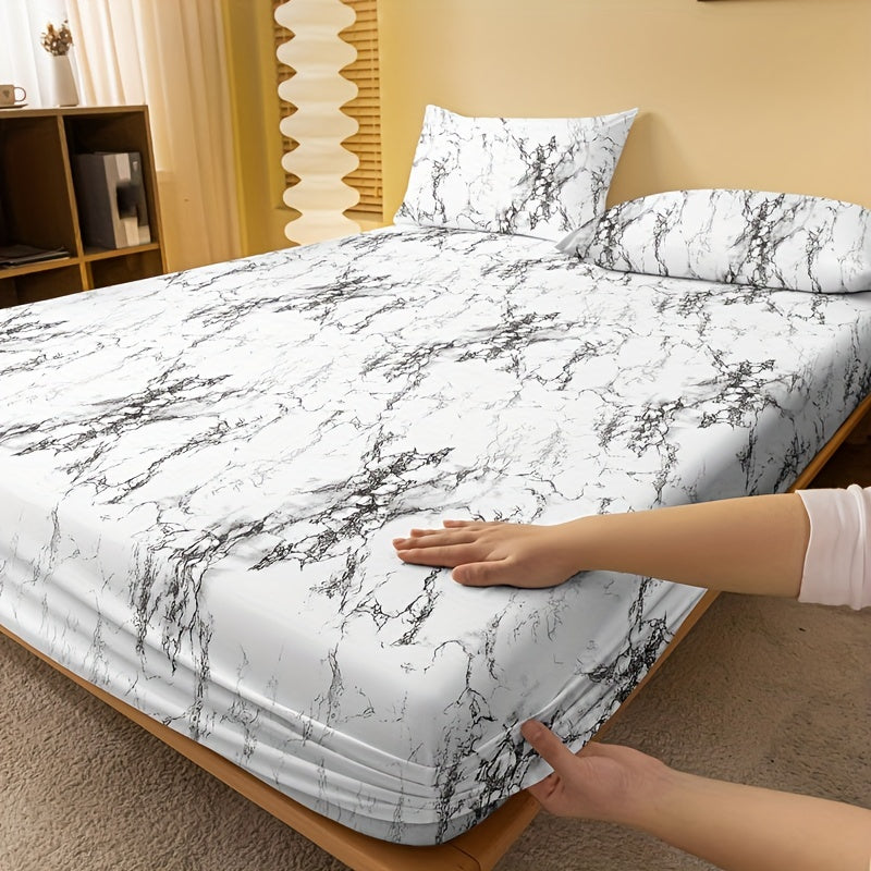 Get cozy with our 1 piece Brushed Fitted Sheet in a soft and comfortable marble print. This bedding essential is perfect for your bedroom, guest room, or any space needing a touch of luxury. Featuring deep pockets for a secure fit, this fitted sheet is