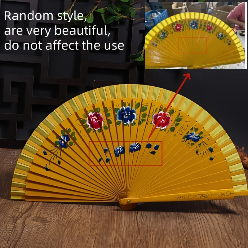 Wooden Spanish folding fan for dancing and home decoration with printed design, conveniently folds for easy storage.