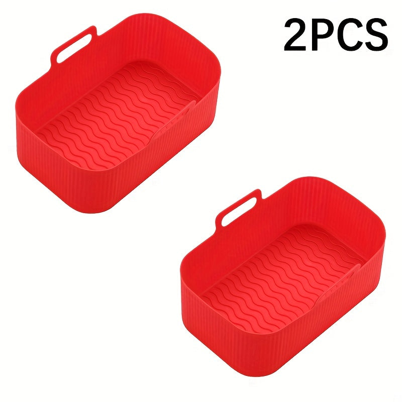 Set of 2 Silicone Air Fryer Liners in a rectangular shape (19.48cm X 12.5cm) for your NINJA DZ201 air fryer. These liners can be used as pots, basket bowls, and baking trays, making them versatile and reusable kitchen accessories. Perfect for baking and