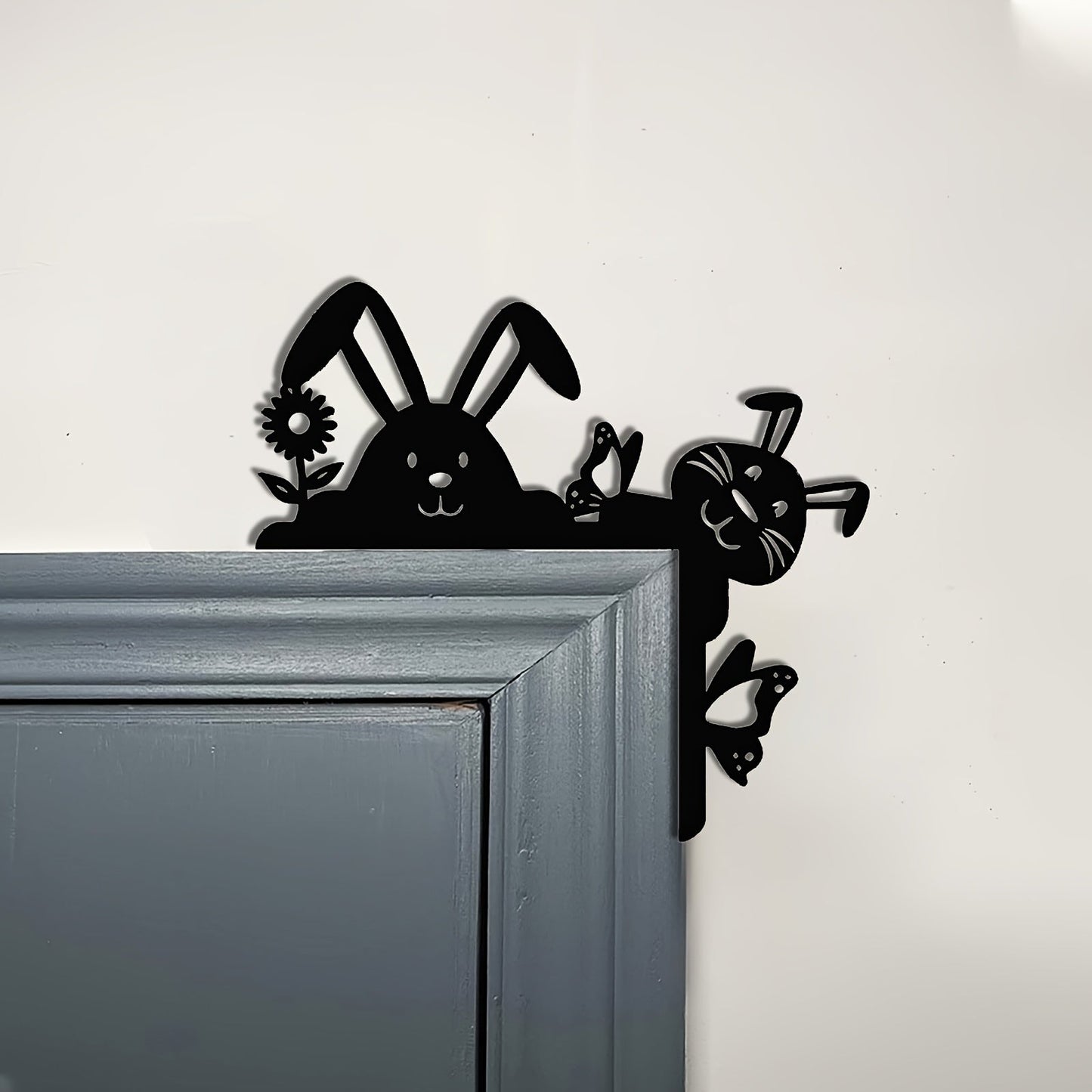 Add a festive touch to your home with this unique Metal Easter Bunny Logo Decoration that hangs elegantly in the door corner. Crafted from black iron, this charming piece is perfect for adding a festive Easter vibe to any space.