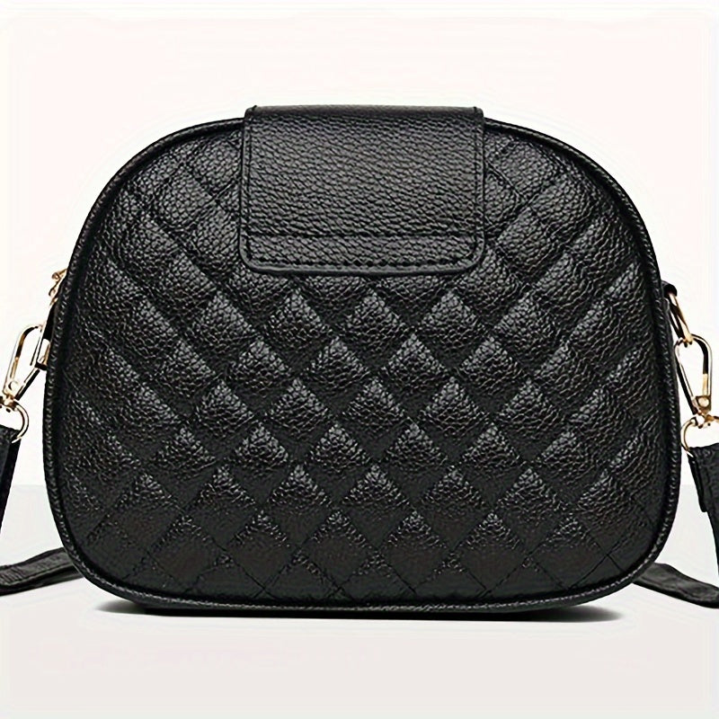 Women's black quilted crossbody bag with adjustable strap, zipper closure, tassel embellishment, and polyester lining.