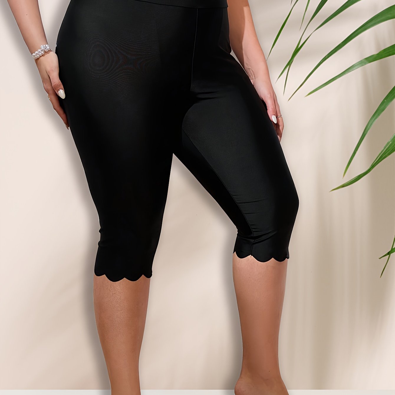 Plus size high waist swim capris pants with scallop trim for women's water sports.