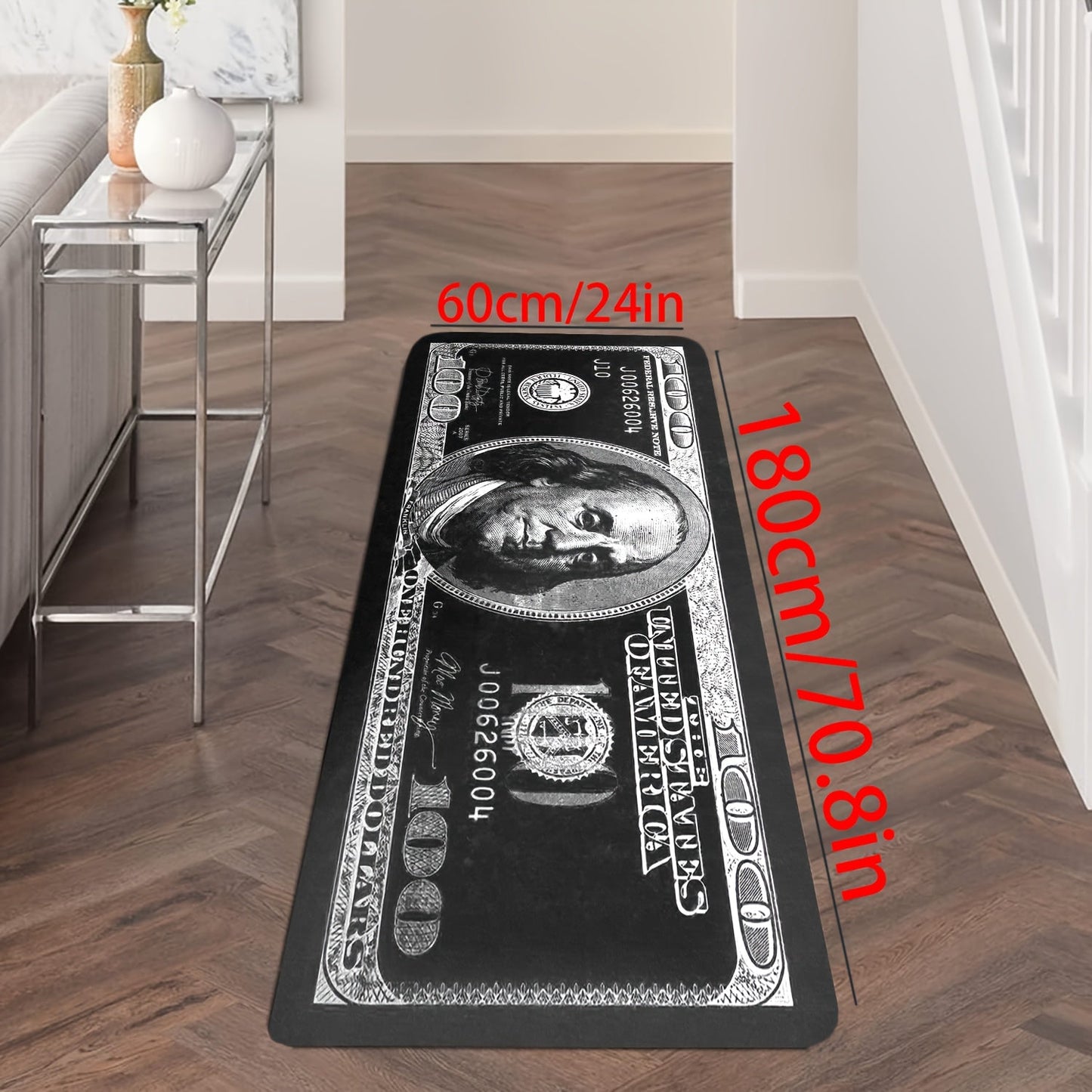 Transform your hallway with this stylish 1-piece Dollar Bill Runner Carpet in black and white. Perfect for adding a modern touch to your kitchen decor or bedroom, this non-skid rug is sure to enhance your home's ambiance.