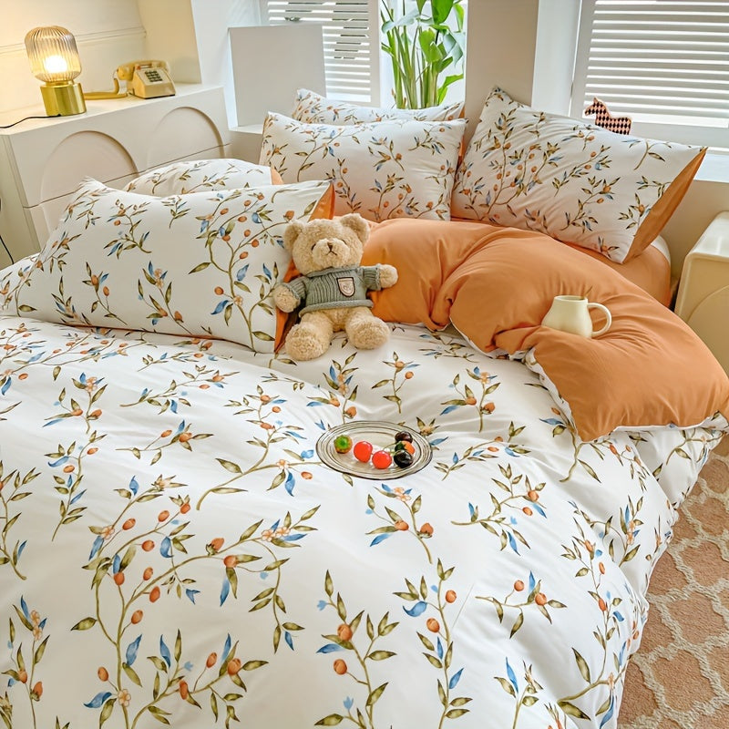 Orange flower and fruit plant pattern quilt cover set includes 1 quilt cover and 2 pillowcases in a pastoral style. Made from comfortable and skin-friendly material, it is non-ball and can be machine washed. Available in single, double, standard, and