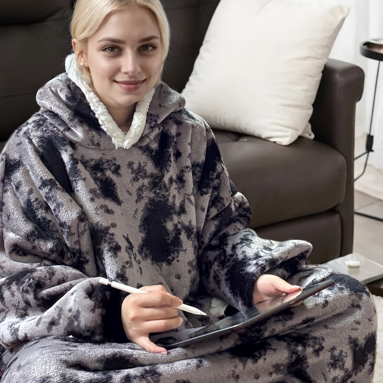 Cozy up in style with this vintage-inspired oversized plaid flannel couple's blanket hoodie. Made with polyester that is machine washable and stain resistant, this wearable blanket features a unique digital print of an octopus animal theme. Perfect for