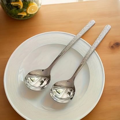 Upgrade your dining experience with our elegant New Light Luxury Hammer Pattern Stainless Steel Spoons. Available in sets of 4pcs, 8pcs, 12pcs, and 15pcs, these spoons are perfect for use in restaurants, for main course meals, for everyday use at home