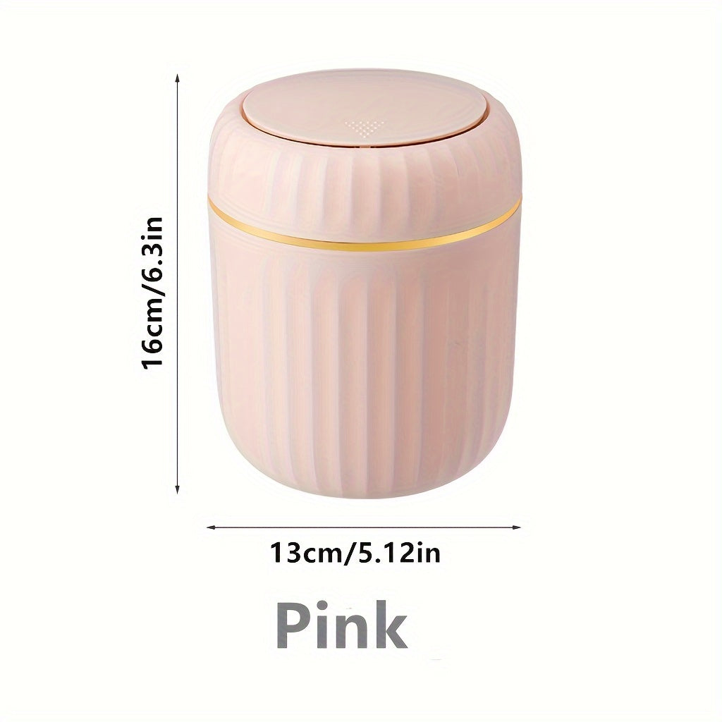 Press-top mini trash can made of durable PP material, ideal for office, bedroom, or living room. Equipped with lid for convenient waste disposal at home.