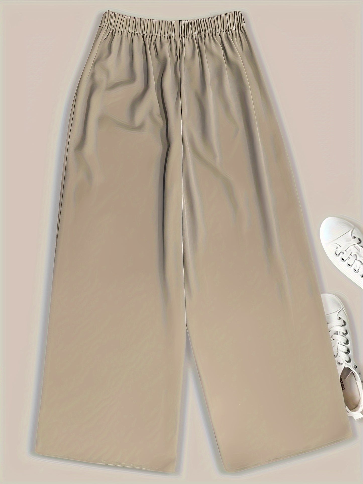 Women's plus size elegant wide leg pants with solid button detail and elastic waist