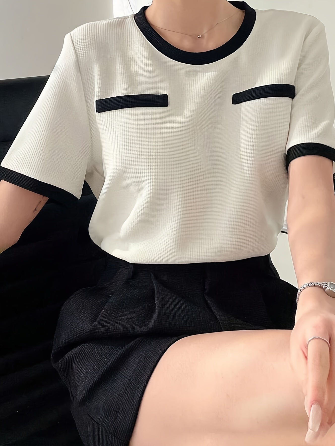 Timeless appeal, women's crew neck blouse in color block design. Made of soft polyester, machine washable, suitable for all seasons.