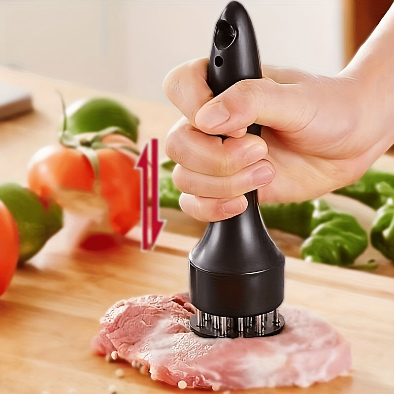 RV kitchen meat tenderizer, stainless steel tool for camping and home kitchens.