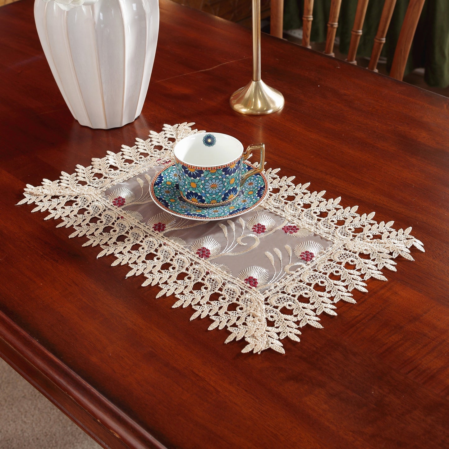 Polyester embroidered table runner for holiday and wedding decor.