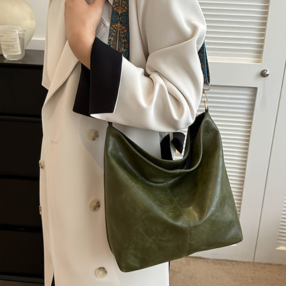 Youthful, multi-functional crossbody tote bag with large capacity for shopping and commuting.