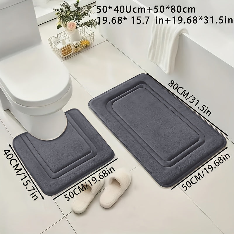 Two coral fleece bath mats, absorbent and non-slip, made from soft polyester knit fabric, 530gsm, 1.3cm thick, suitable for tub, shower, and bathroom decor.