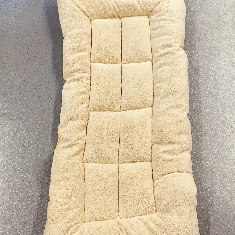 Large plush dog bed for small to large breeds, with non-slip bottom and checkered design for comfort.