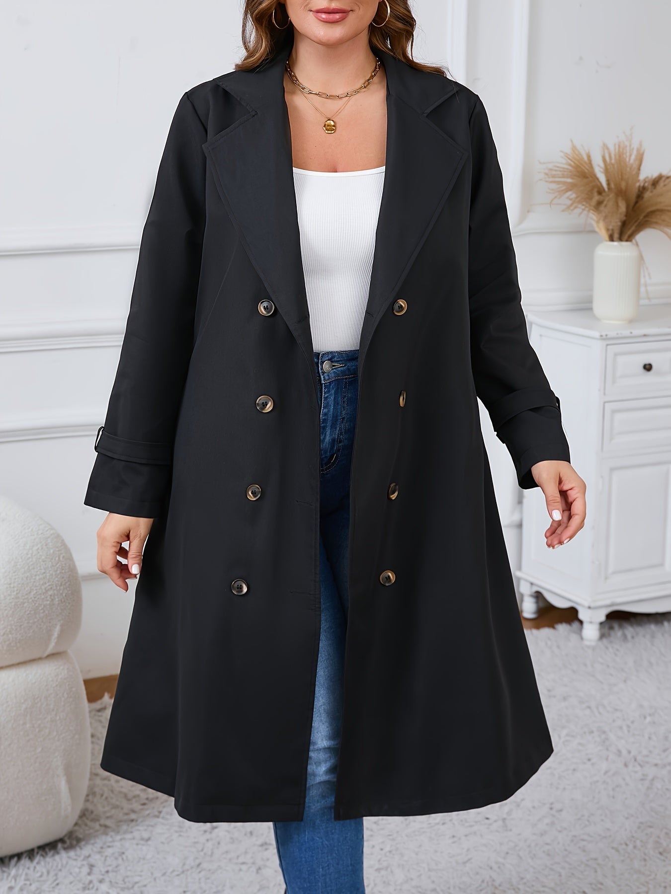 Plus size trench coat in casual style, made of 100% polyester with a double-breasted design. Features long sleeves, solid color, and lapel collar. Regular fit, non-stretch woven fabric