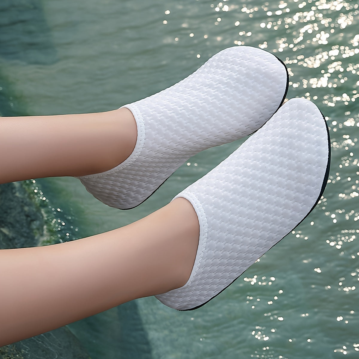 Durable slip-on water shoes for women, perfect for swimming, surfing, boating, fishing, and beach activities.