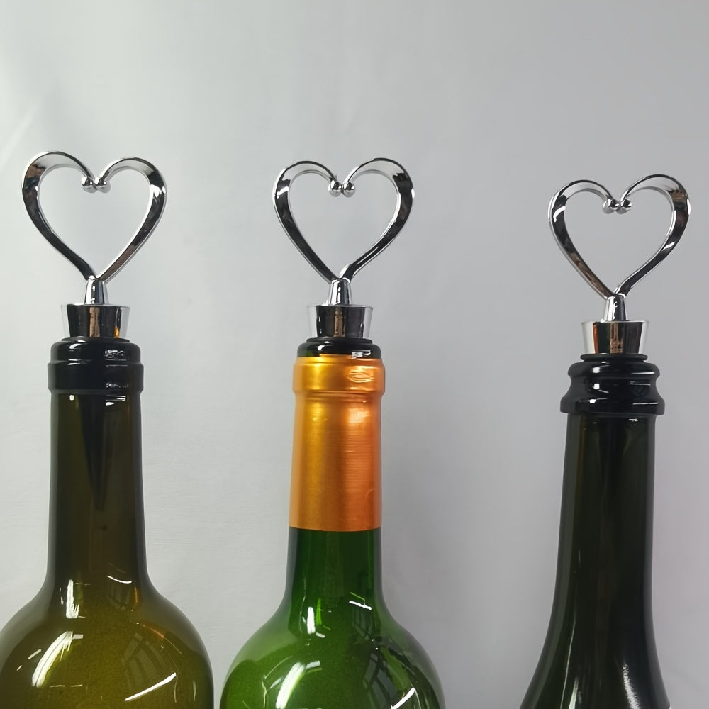 Hot selling heart-shaped red wine bottle stopper made of plastic and silicone, 1-8 pieces available.