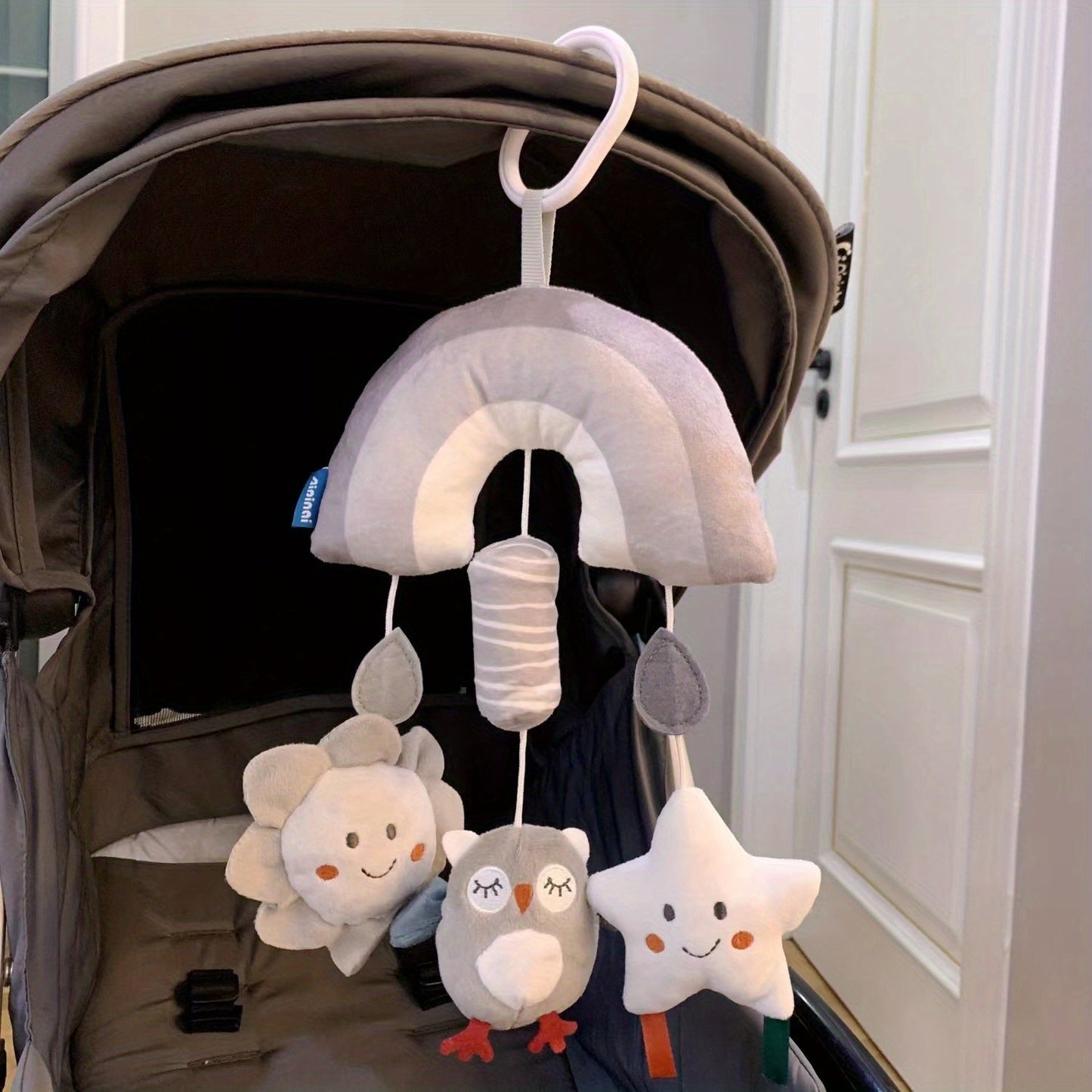 Soft plush animal wind chime, ideal for attaching to baby's car seat, stroller, or crib!