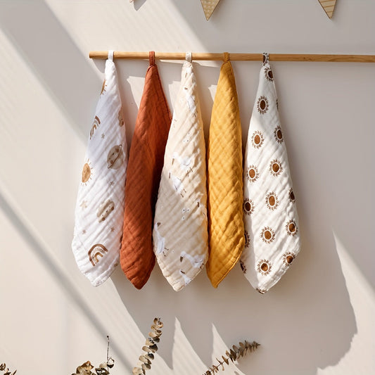 Set of 5 Bamboo Muslin Square Towels featuring adorable prints. These soft, 4-layer face towels can also be used as burp cloths.