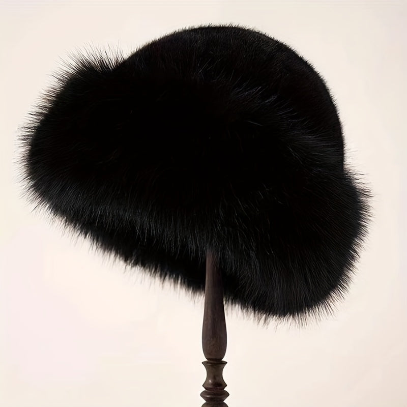 Stylish faux fur bucket hat for women with warm polyester lining.