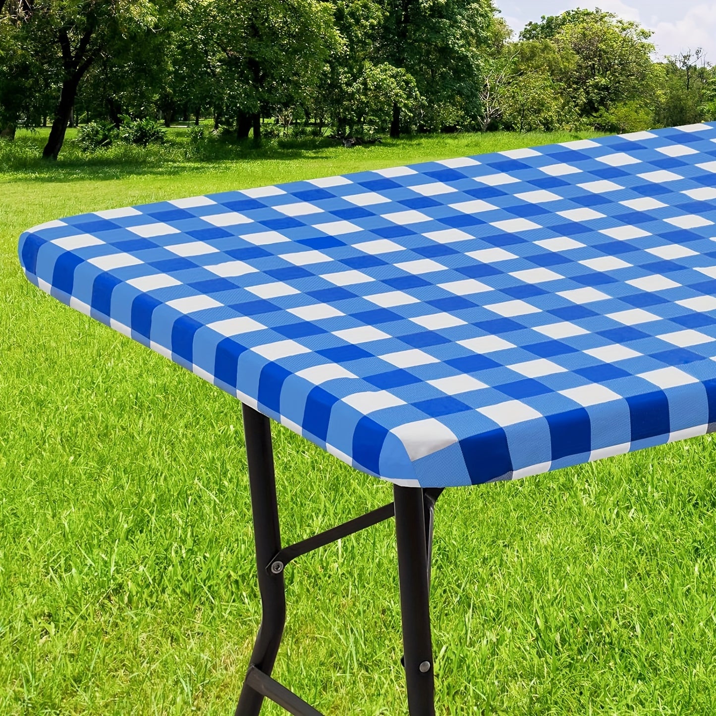 Waterproof vinyl table cover with flannel backing and elastic edge, featuring a gray and white geometric pattern. Ideal for indoor and outdoor use on home patio. Machine-woven fabric with easy-clean surface.