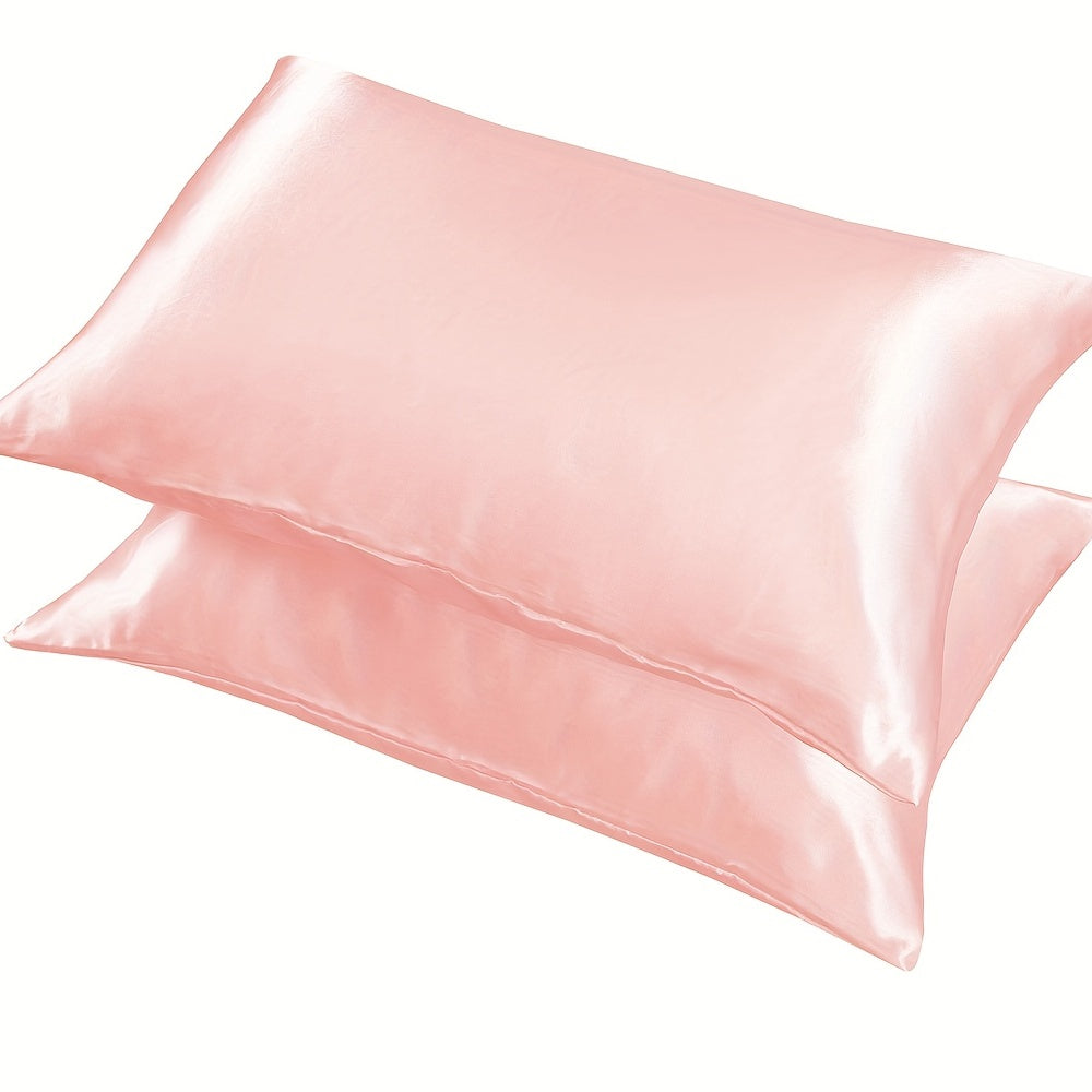 1 set of Satin Pillow Cases in a Solid Color, made with Silky Soft and Breathable material. These Pillowcases feature an Envelope Closure for a smooth and luxurious feel. Perfect for use in the Living Room, Bedroom, or Hotel, these Pillow Covers do not