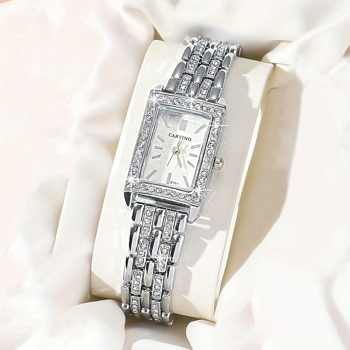 Elegant women's wristwatch with rhinestone jewelry and rectangular zinc alloy case, featuring quartz movement. Ideal gift for birthday or holiday.