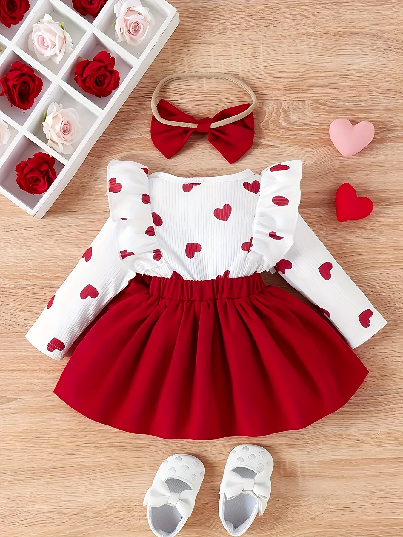 Valentine's Day dress with lace, big bow, love print, and headwear.