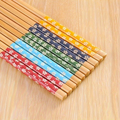 5 pairs of premium reusable bamboo chopsticks with multicolor non-slip design, lightweight and dishwasher safe.