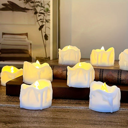 4 battery operated LED tea light candles in warm white for Christmas decoration.