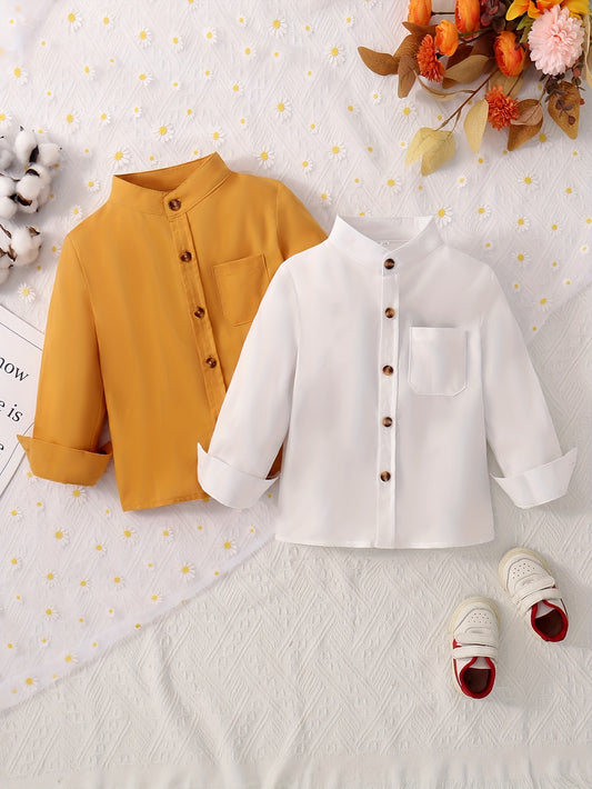 2 boys solid color stand collar shirts with long sleeves and button-up design, suitable for spring and fall wear.