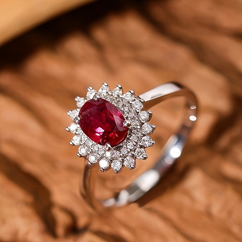 This exquisite ring features an elegant design with a 925 sterling silver oval flower setting, adorned with a sparkling December birthstone cubic zirconia. It is the perfect gift for women, whether as an engagement ring or for any special occasion.